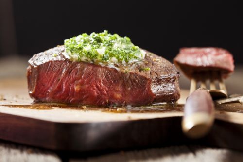 Strip Steaks with Herbed Butter